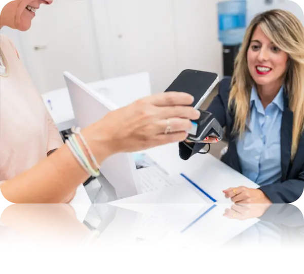 Client using POS system to make a payment at a medical spa.