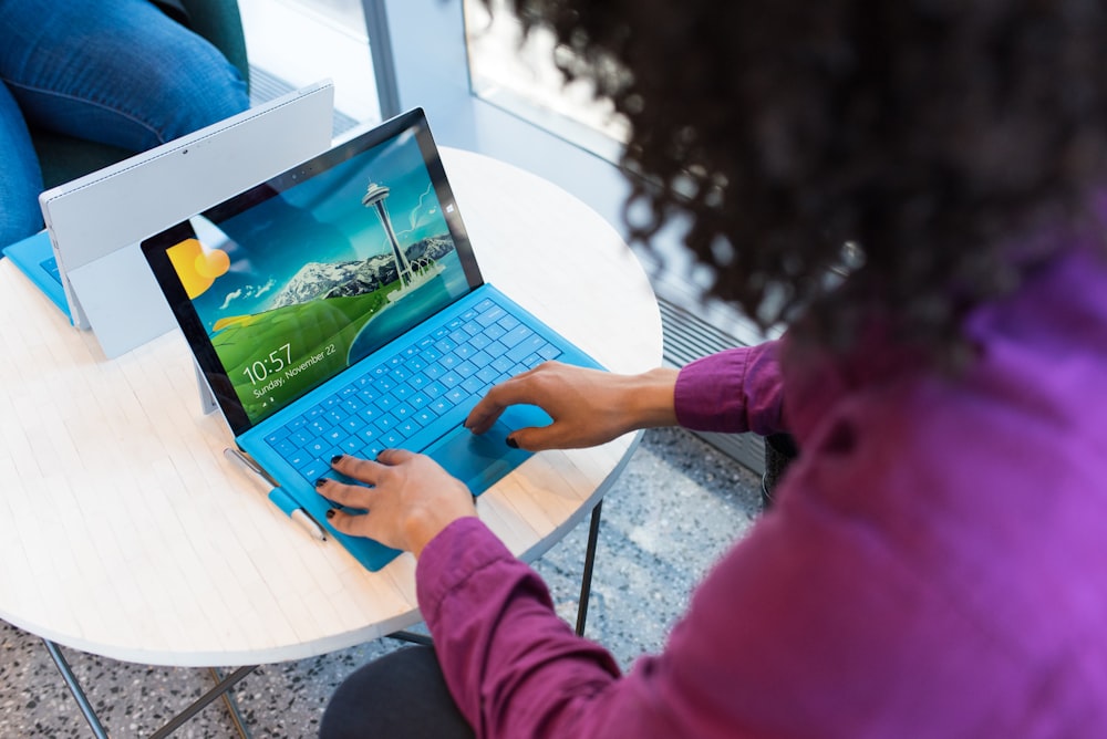Person using a tablet for digital intake