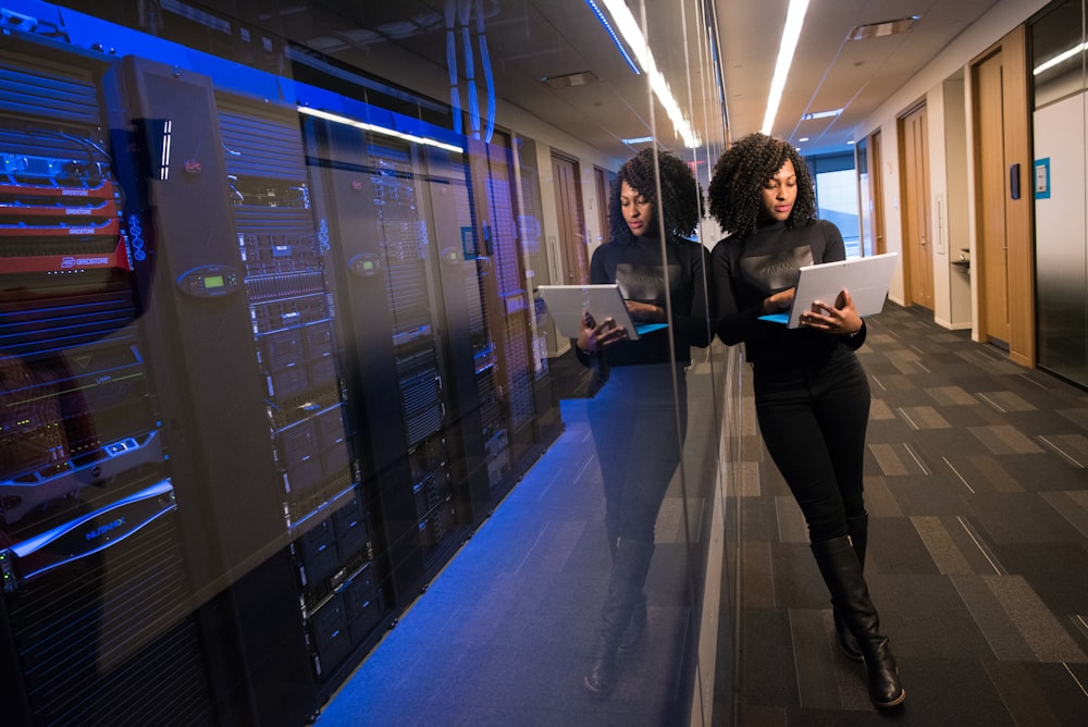 Staff member checking schedule on tablet